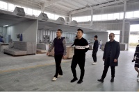 蓝光材料设备集团总裁詹学军一行莅临千川木门湖北生产基地考察交流